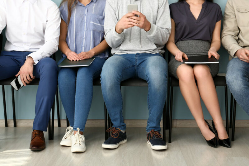 Young people waiting for job interview indoors